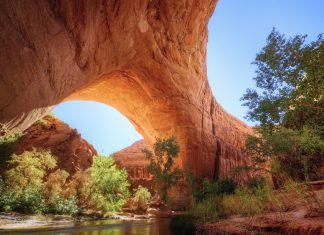 Coyote Gulch: Utah’s Oasis Canyon of Natural Arches, Waterfalls and Towering Navajo Cliffs